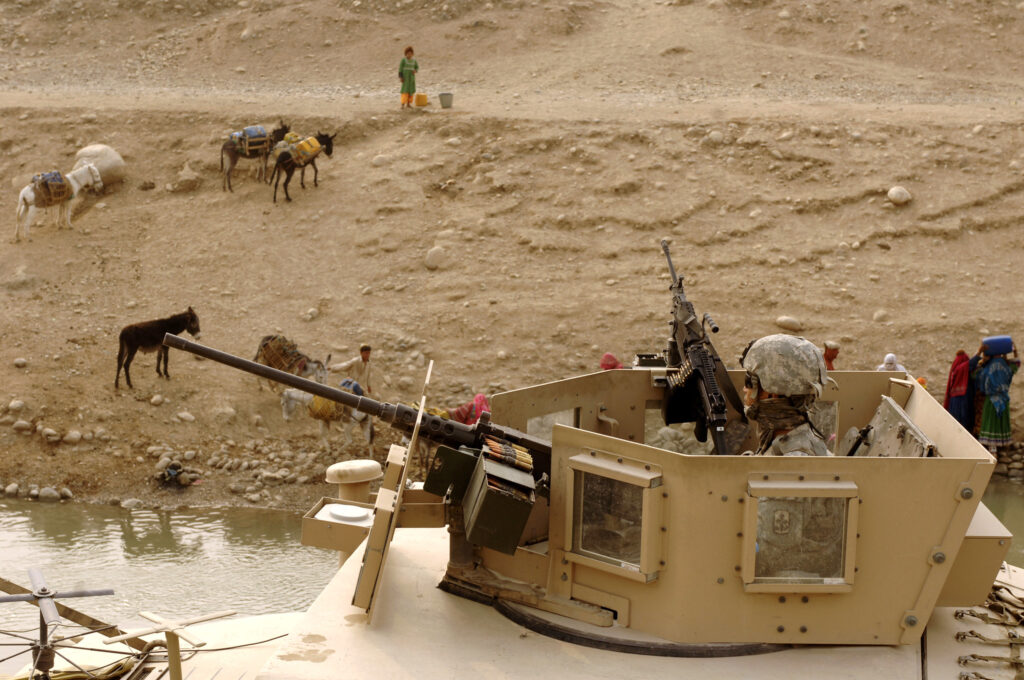 Afghan donkeys with Humvee