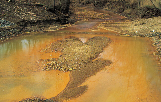 Iron hydroxide precipate in stream in a sacrifice zone