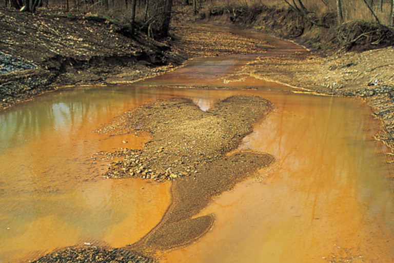 Iron hydroxide precipate in stream in a sacrifice zone