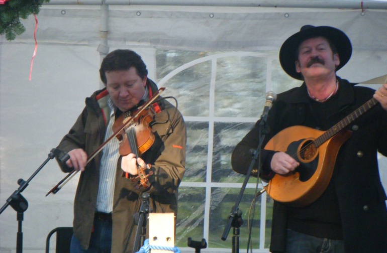 Musicians celebrating Wren Day in local woods.