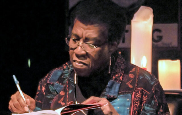 Octavia Butler signing books