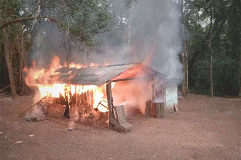 Multinational forestry company Arauco arrests and burns the homes of indigenous and campesino people living in their ancestral forest territories. Photo: Registro de las familias afectadas por Arauco (Families Affected by Arauco)