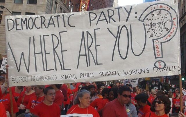 Banner querying Rahm Emanuel and the Democratic Party, displayed by striking Chicago teachers.