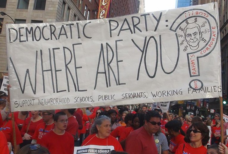 Banner querying Rahm Emanuel and the Democratic Party, displayed by striking Chicago teachers.