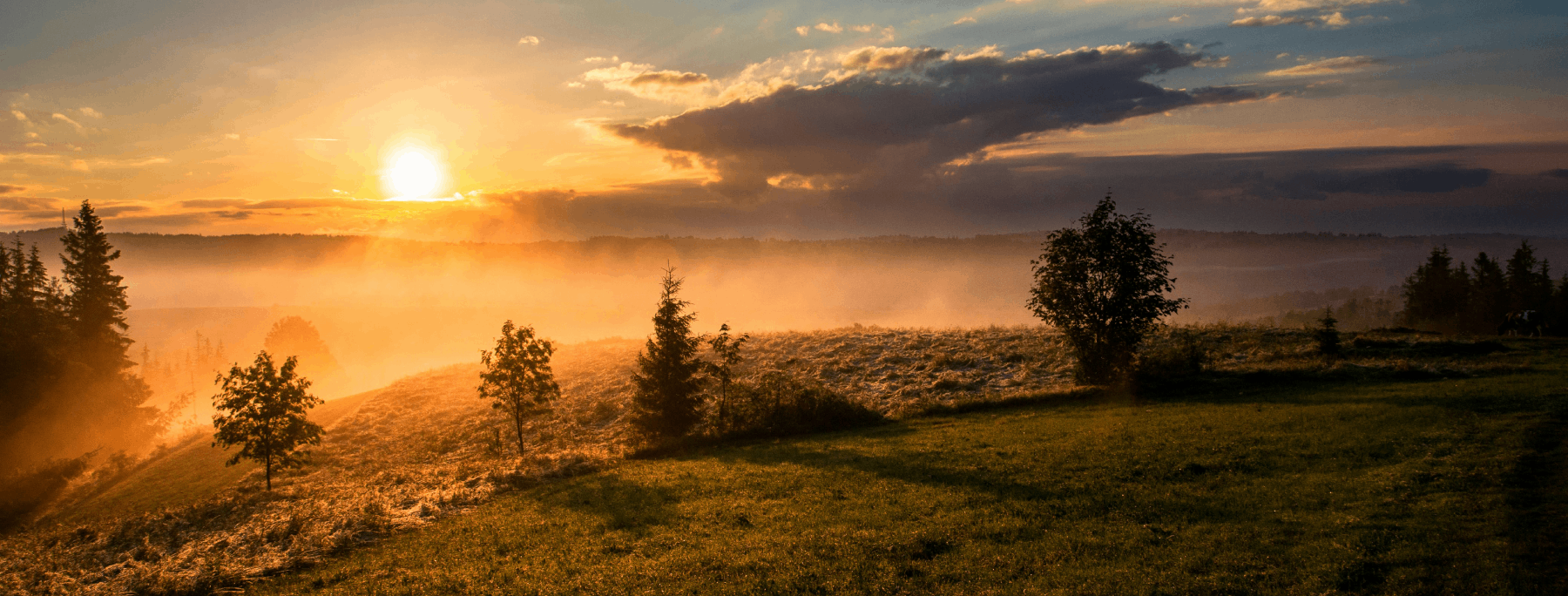 Sunrise and clouds from a hill